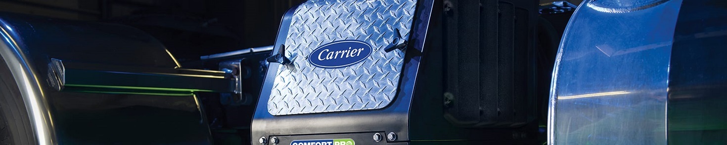 A Carrier auxiliary power unit sitting on a truck in the sun.